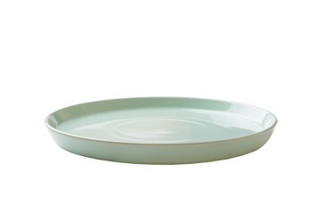 Blue ceramic round plate isolated over white background. perspective view