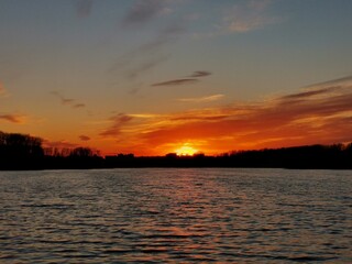 Fototapeta premium sunset over the river