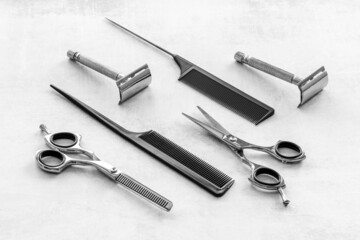 Set of barber shop equipment with hairdressing scissors and combs