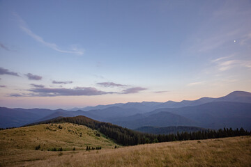 concept of evening sky in the mountains. the beauty of hiking in the mountains. landscape on top of the mountain