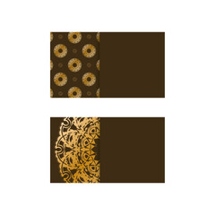 Brown business card template with Indian gold pattern for your contacts.