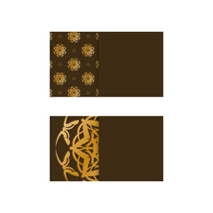 Business card in brown color with a luxurious gold pattern for your contacts.