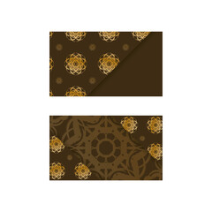 Business card in brown color with luxurious gold ornaments for your personality.