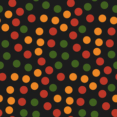 Abstract Kwanzaa, Black History Month, Juneteenth seamless pattern with dots in traditional African colors - black, red, yellow, green on black. Vector ethnic background design