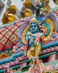Krishnan statue from gopuram of Sri Krishnan Temple. It is a Hindu temple in Singapore. Built in 1870 and gazetted as a national monument of Singapore in 2014.