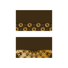 Business card in brown with Greek gold ornaments for your business.