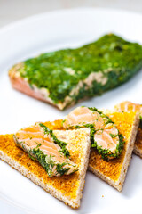 marinated salmon in dill on toast bread
