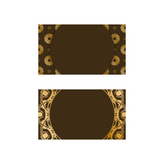 Brown business card with vintage gold ornaments for your personality.