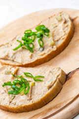 cracklings spread on bread with spring onion