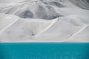 The white sand mountains and lake in Kashgar Prefecture, Xinjiang, China.