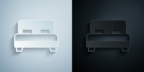 Paper cut Big bed for two or one person icon isolated on grey and black background. Paper art style. Vector