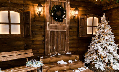 Christmas front door of a country house background. Concept Happy Christmas, New Year, holiday, winter, greetings.