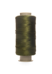 Spool of olive green sewing thread isolated on white