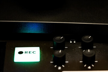 Audio Mixer detail with button and knobs for audio mixing and editing. Workstation for audio and...