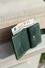 hand made leather wallet . Leather craft. Selective focus