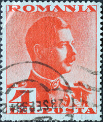 Romania - Circa 1934 : a postage stamp printed in the Romania showing a portrait of Carol II of...