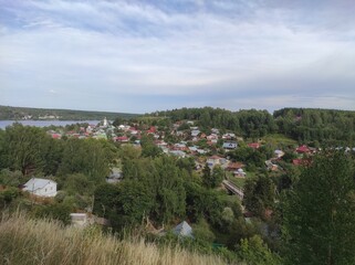 Nature near the Volga river. The coast with trees and other vegetation. The Volga River in Russia.