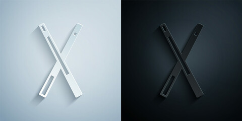 Paper cut Crossed billiard cues icon isolated on grey and black background. Paper art style. Vector