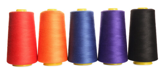 Set of colorful sewing threads on white background