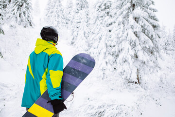 man snowboarder in ski equipment