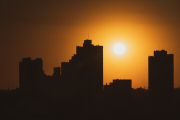 sun setting on the city