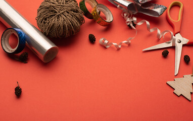 Christmas gift warping composition on bright red background