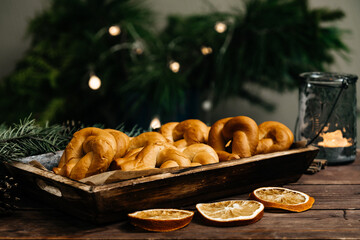 Christmas buns on a wooden board. Christmas. New Year's mood. High-quality photography