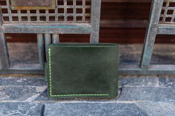 hand made leather wallet . Leather craft. Selective focus