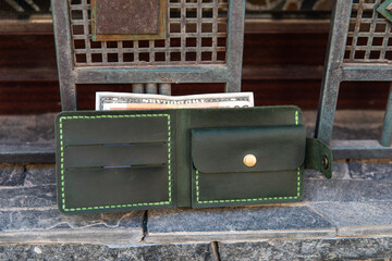 hand made leather wallet . Leather craft. Selective focus