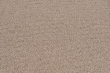 Fototapeta na wymiar Sand background and texture with onduline