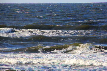 Seascape during a storm with big waves, close-up, Carnikava, Latvia. Big and powerful sea waves during the storm