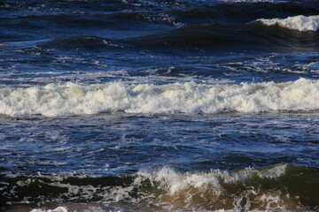 Seascape during a storm with big waves, close-up, Carnikava, Latvia. Big and powerful sea waves during the storm