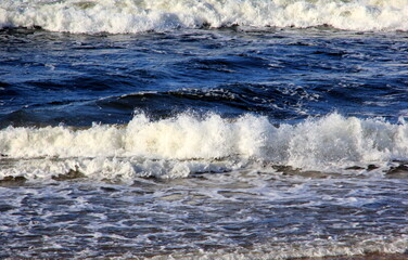 Seascape during a storm with big waves, close-up, Carnikava, Latvia. Big and powerful sea waves during the storm