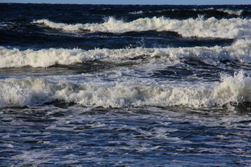 Seascape during a storm with big waves, close-up, Carnikava, Latvia. Big and powerful sea waves during the storm 