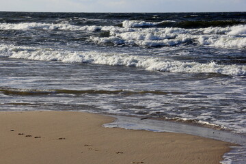 Seascape during a storm with big waves, close-up, Carnikava, Latvia. Big and powerful sea waves during the storm 