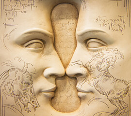 Plaster bas-relief, two faces opposite. Leonardo, thin line drawing of a carved horse.