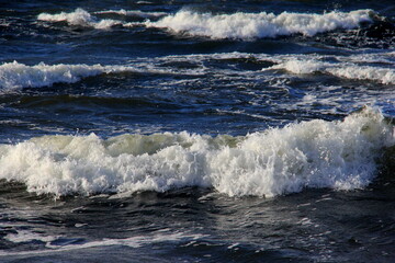 Seascape during a storm with big waves, close-up, Carnikava, Latvia. Big and powerful sea waves during the storm 