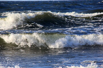 Seascape during a storm with big waves, close-up, Carnikava, Latvia. Big and powerful sea waves during the storm 