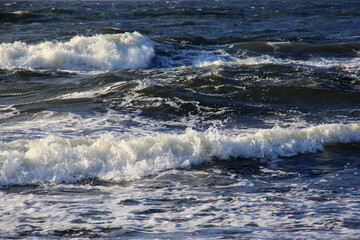 Seascape during a storm with big waves, close-up, Carnikava, Latvia. Big and powerful sea waves during the storm 