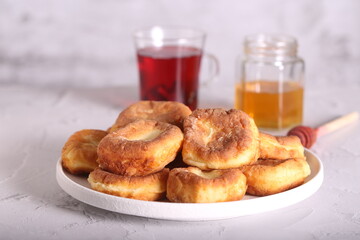 fresh cheesecakes with tea are on the table