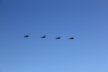 Helicopters in the sky