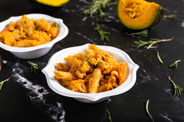 Pasta with pumpkin and welnuts, a complete vegetarian dish. Ideal for an autumn lunch
