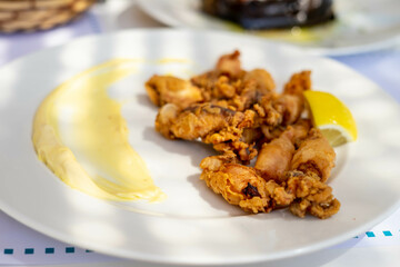 Fried baby squid in a tavern in Greece