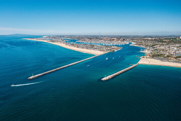 An aerial view of Newport Harbor, Balboa Island, and the Wedge in Newport Beach, California.