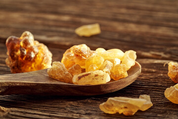 Frankincense resin on a spoon on a table