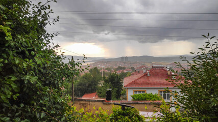  cloudy sky and town view from a balcony in greenery