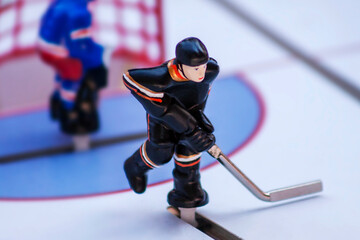 foosball hockey player in action