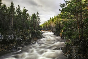 Long exposure shot of Mala river in Mala-Storforsens nature reserve in Sweden