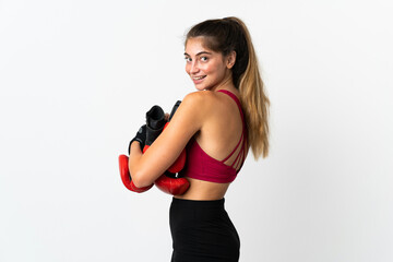 Young caucasian woman isolated on white background with boxing gloves