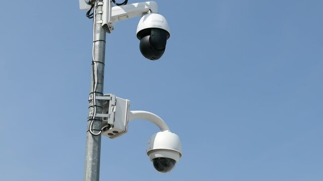 Public Surveillance CCTV Security Camera Scanning and Monitoring the Area